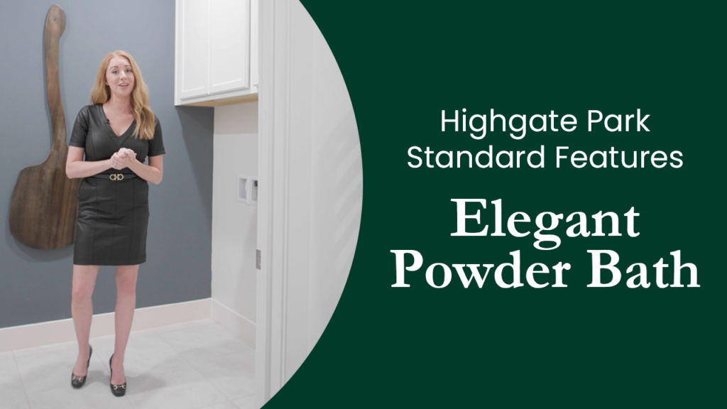 A woman in a business attire stands in a modern powder bath with a presentation text "highgate park standard features - elegant powder bath" next to her.