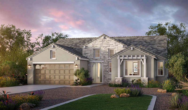 A modern single-story house with gray siding, stone accents, a two-car garage, large windows, and a small covered porch. The front yard features gravel paths, green bushes, and colorful flowers under a cloudy evening sky.