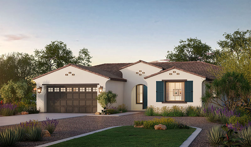 Single-story house with white stucco walls, brown tiled roof, and blue window shutters. A two-car garage is on the left, surrounded by a landscaped yard with gravel, plants, and trees under a clear sky.