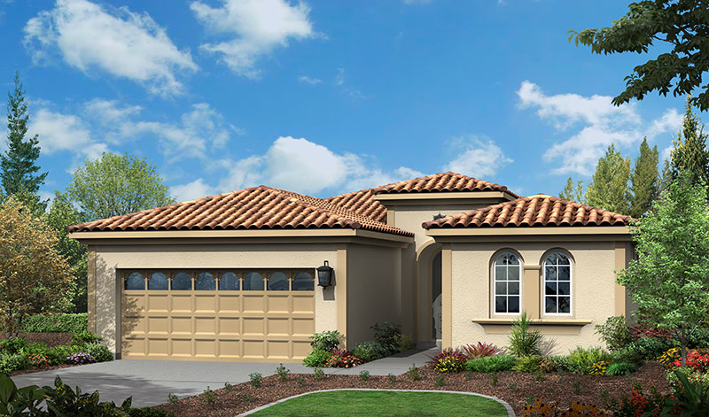 A single-story house with a tan stucco exterior, red tile roof, arched windows, and a double garage, surrounded by green landscaping and trees under a blue sky with scattered clouds.